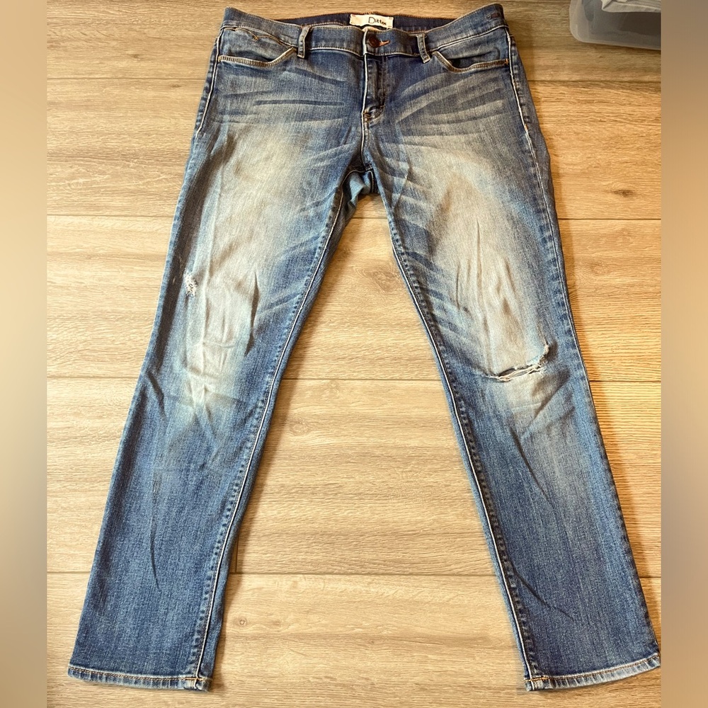 Light blue ripped jeans